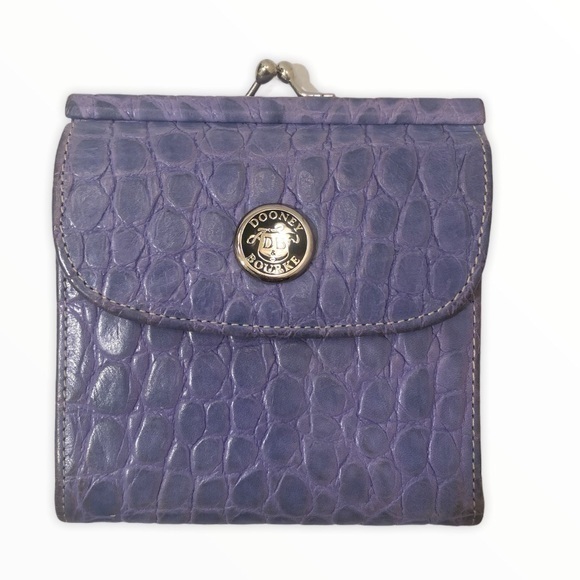 Dooney & Bourke Handbags - DOONEY and bourke vintage embossed leather wallet